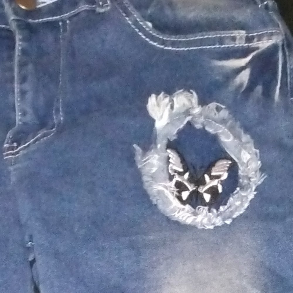 Fashion jeans embroidery butterfly on them